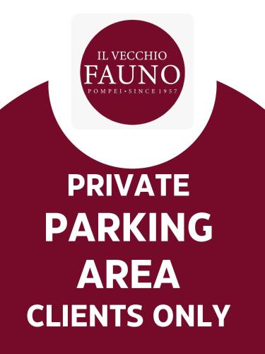 a sign that reads private parking area clients only at Il vecchio Fauno in Pompei