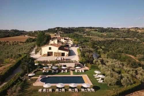 an aerial view of a estate with a swimming pool at The Podere Wine Resort Chianti in Barberino di Val dʼElsa