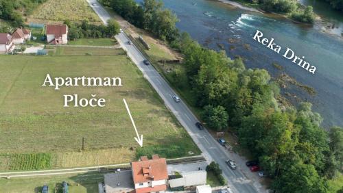 an aerial view of a road next to a river at Apartman Ploče in Bajina Bašta