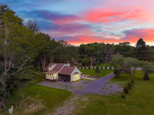 an aerial view of a house in a field at Cabin in Long Pond Gameroom Pool Table in Long Pond