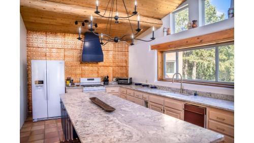a kitchen with a large counter top in a room at Casa Angel in Valdez