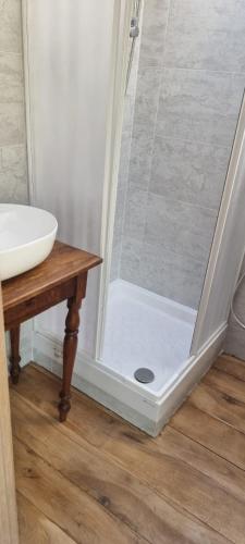 a bathroom with a shower and a sink at Tuscany House Retreat in Casentino in Subbiano
