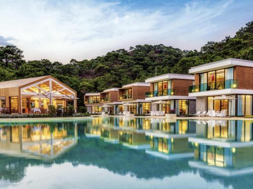 a rendering of a resort with a pool at Rixos Premium Tekirova - The Land of Legends Access in Tekirova