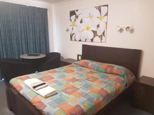 Postel nebo postele na pokoji v ubytování Carnarvon Gateway Motel