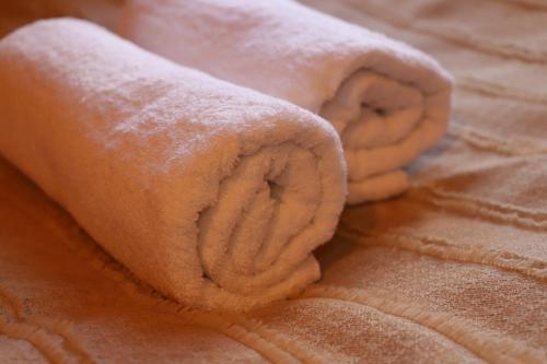 a close up of a rolled up towel at Hotel - Old Ushguli in Ushguli