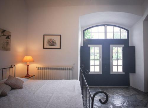 Monte do Ravasco Country House tesisinde bir odada yatak veya yataklar