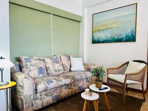a living room with a couch and two chairs at Remodeled Margarita Apt Pool in Porlamar