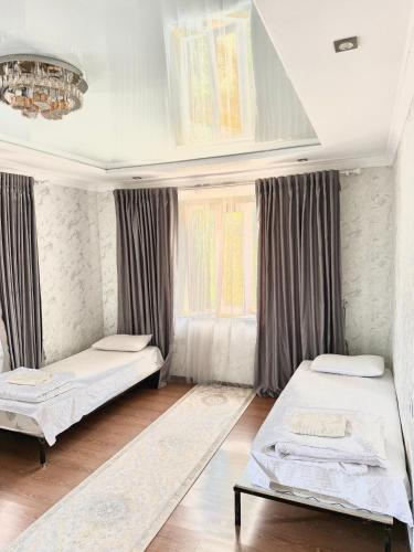 Lova arba lovos apgyvendinimo įstaigoje Kut Hotel Osh