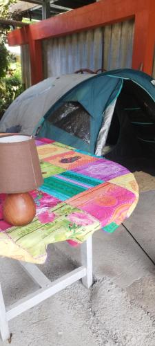 a tent sitting on top of a picnic table at Banian Camping petit déjeuner offert in Bora Bora