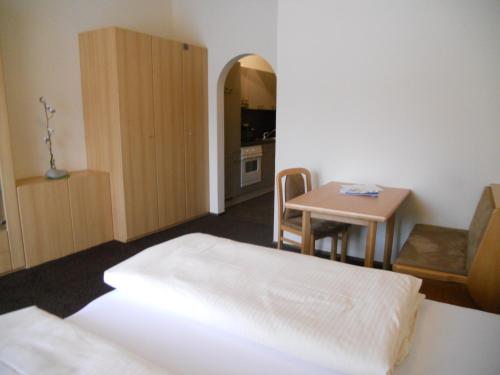 A bed or beds in a room at Appartementhaus Wetterloch