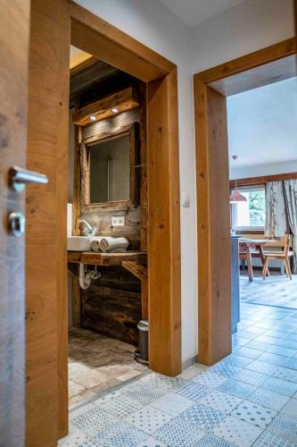 a bathroom with a sink and a mirror at Untersillerhof in Neustift im Stubaital