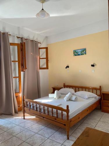 a bedroom with a large bed in a room at Studios Julia in Petra
