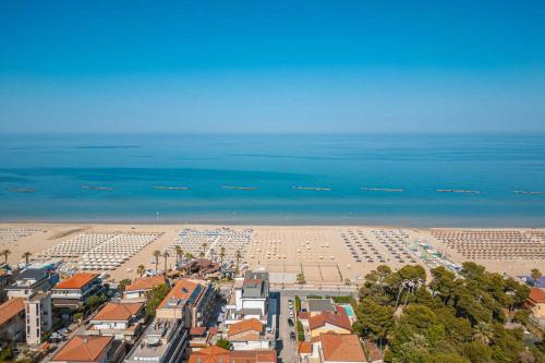 an aerial view of a beach with buildings and the ocean at Hotel IL MORO in Roseto degli Abruzzi