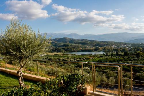 a view of a valley with a river and mountains at Aksos Suites Accessible Accommodation in Ayiá