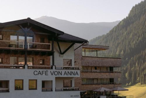 a building with a sign that reads cafe vent amanu at Hotel Marten -Joker Card Partner- in Saalbach-Hinterglemm
