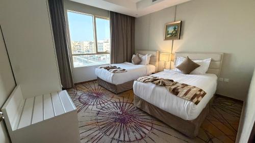 Lova arba lovos apgyvendinimo įstaigoje Seven Gardens Hotel