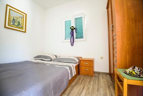 Posteľ alebo postele v izbe v ubytovaní Sunny Side Apartments