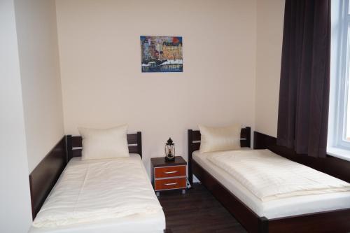 Katil atau katil-katil dalam bilik di MY-BED Hamburg