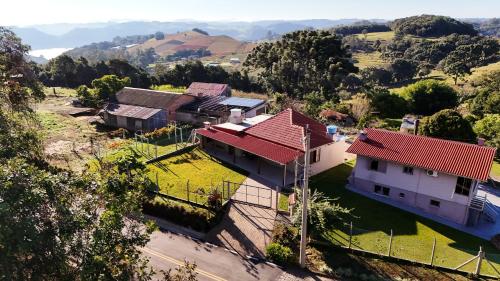 an aerial view of a house with a red roof at Casa Nona Chema in Bento Gonçalves