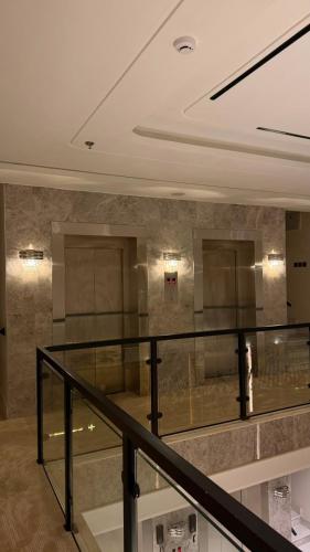 a lobby of a building with a glass railing at فندق لوسكا in Abha