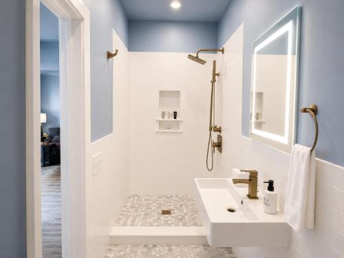 a bathroom with a sink and a shower at Pilgrim House in Provincetown