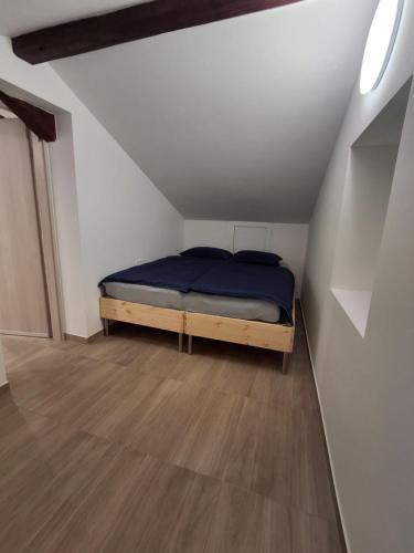 a bedroom with a bed in a attic at Villa Ivana in Koper
