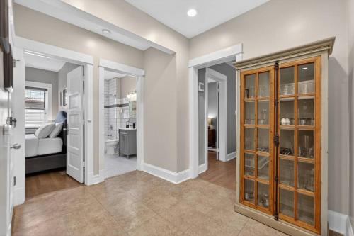 a room with a bed and a room with a bedroom at Your Chicago Retreat in Chicago