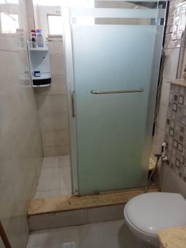 a bathroom with a shower with a toilet in it at Pieds dans l'Eau Douaouda in Fouka
