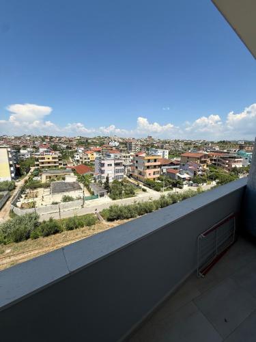 a balcony with a view of a city at Durres-apartament in Durrës