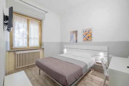 Krevet ili kreveti u jedinici u objektu Affittacamere Limin - Smart Stay - Private Bathroom - near Malpensa , Milano , Rho Fiera