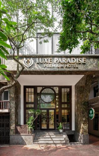 a building with the entrance to the louvre parisisse petroleum hotel at LP Hotel & Spa Pham Hong Thai in Hanoi