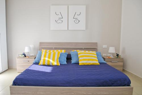 Posteľ alebo postele v izbe v ubytovaní Case Vacanza Giuliana