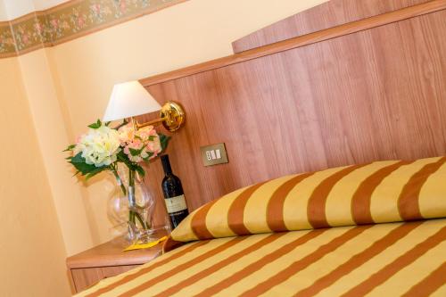 Letto o letti in una camera di Hotel Smeraldo