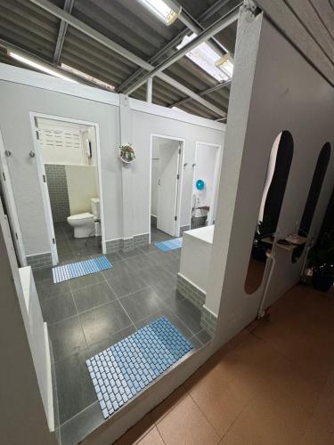 a bathroom with a sink and a toilet in a room at Shiralea Resort in Haad Yao