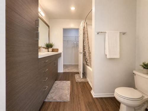 a bathroom with a toilet and a sink at mamihomes redondo beach in Redondo Beach