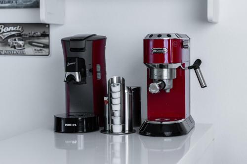 a red blender sitting on top of a counter at Am Wildbach bei Passau in Saming