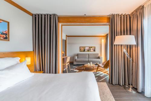 Кровать или кровати в номере Hotel Le Morgane