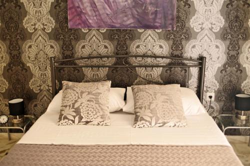 Ένα ή περισσότερα κρεβάτια σε δωμάτιο στο MK Apartment