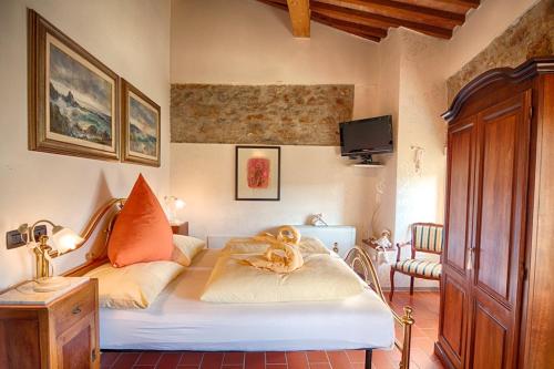 A bed or beds in a room at B&B Puccini