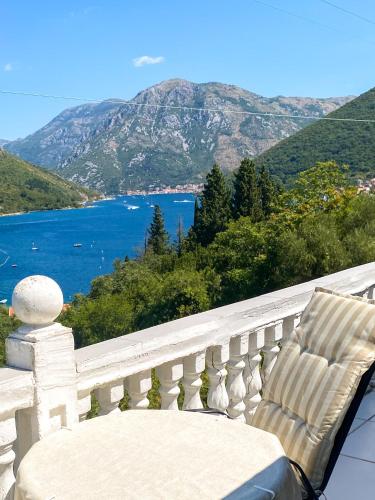 a balcony with a view of a lake and mountains at Open Sky Verige Studio in Donja Jošica