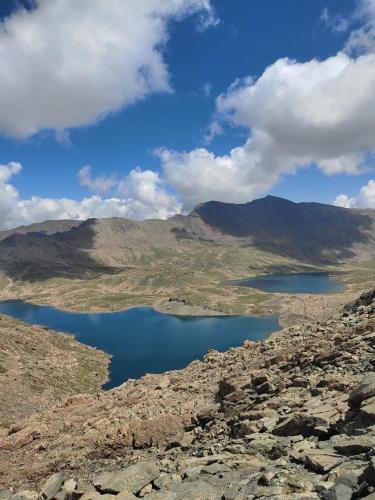 a group of lakes on the side of a mountain at Khan Camping Naranag in Sonāmarg