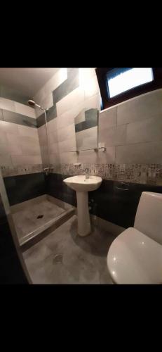 a bathroom with a sink and a toilet at temo lali in Tbilisi City
