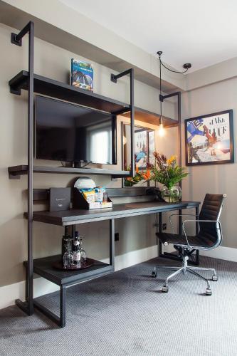 an office with a desk and a chair in a room at Malmaison Edinburgh in Edinburgh