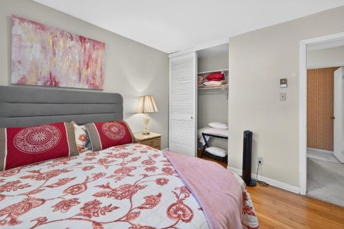 a bedroom with a king sized bed with a large headboard at Muirs Chapel Retreat in Greensboro