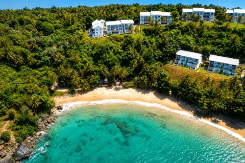 an aerial view of a beach with a resort at Perfect Paradise, Oceanview in Samana in Santa Bárbara de Samaná