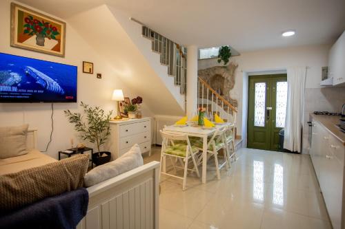 a living room with a kitchen and a dining room at Casa Nora in centre of Vodnjan - Happy Rentals in Vodnjan