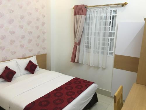 Katil atau katil-katil dalam bilik di Ruby Can Tho Hotel