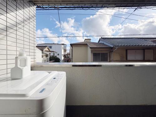 Eizawaken 201 Close to Osaka Dome Taisho Station 5 min walk 3 bedrooms 7 people cooking allowed 2 bathrooms direct access to Kansai Airport