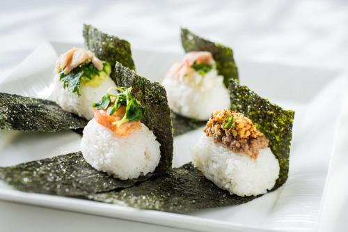 a plate of sushi on a white plate at ANA Crowne Plaza Matsuyama by IHG in Matsuyama