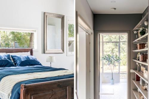 a bedroom with a bed and a window at Aria House in Trentham
